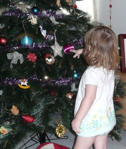 Another generation discovers the Xmas tree -and an original bauble from 1970.